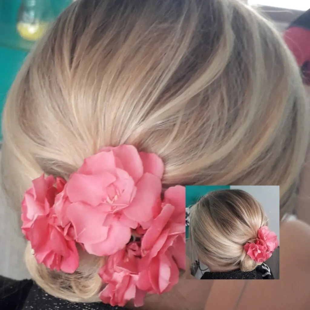 Recogido con flores para evento realizado en Carol Peluquería Unisex