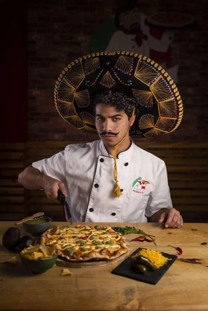 Cocinero de Dasebas Urban Food preparando pizza